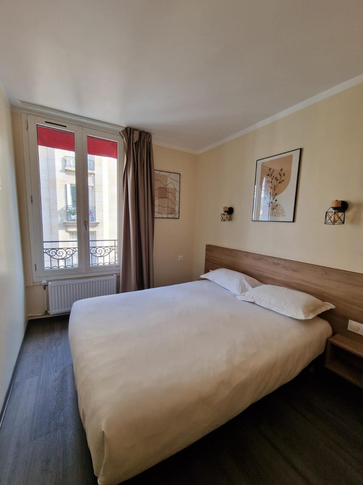 Hotel D'Anjou Levallois-Perret Bagian luar foto