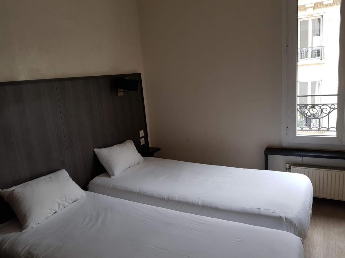 Hotel D'Anjou Levallois-Perret Bagian luar foto